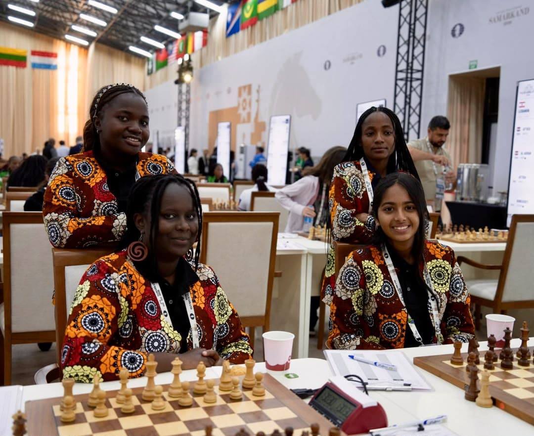 Members of Tanzania’s Women’s team together at the chessboards.