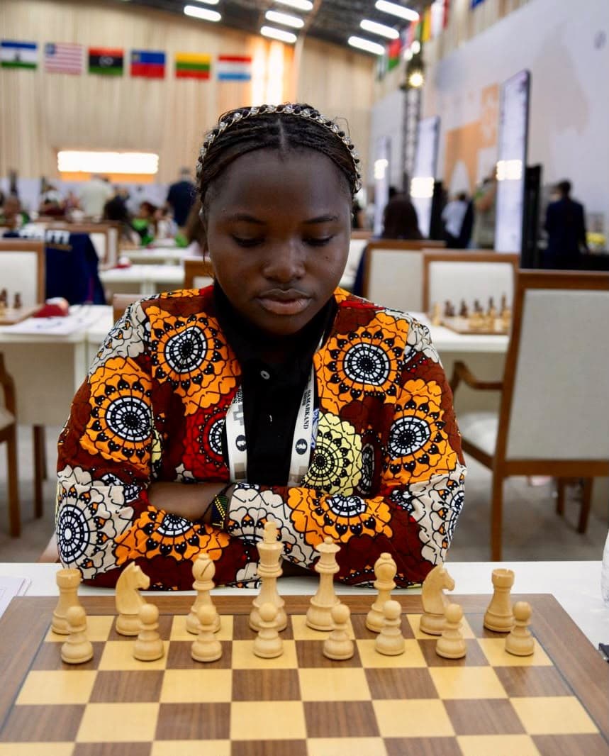 A Tanzanian player concentrating at the board.